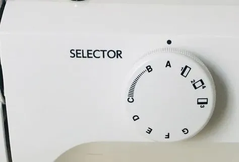 The width of the zigzag is adjusted between B and C. The further towards C, the wider the seam.
