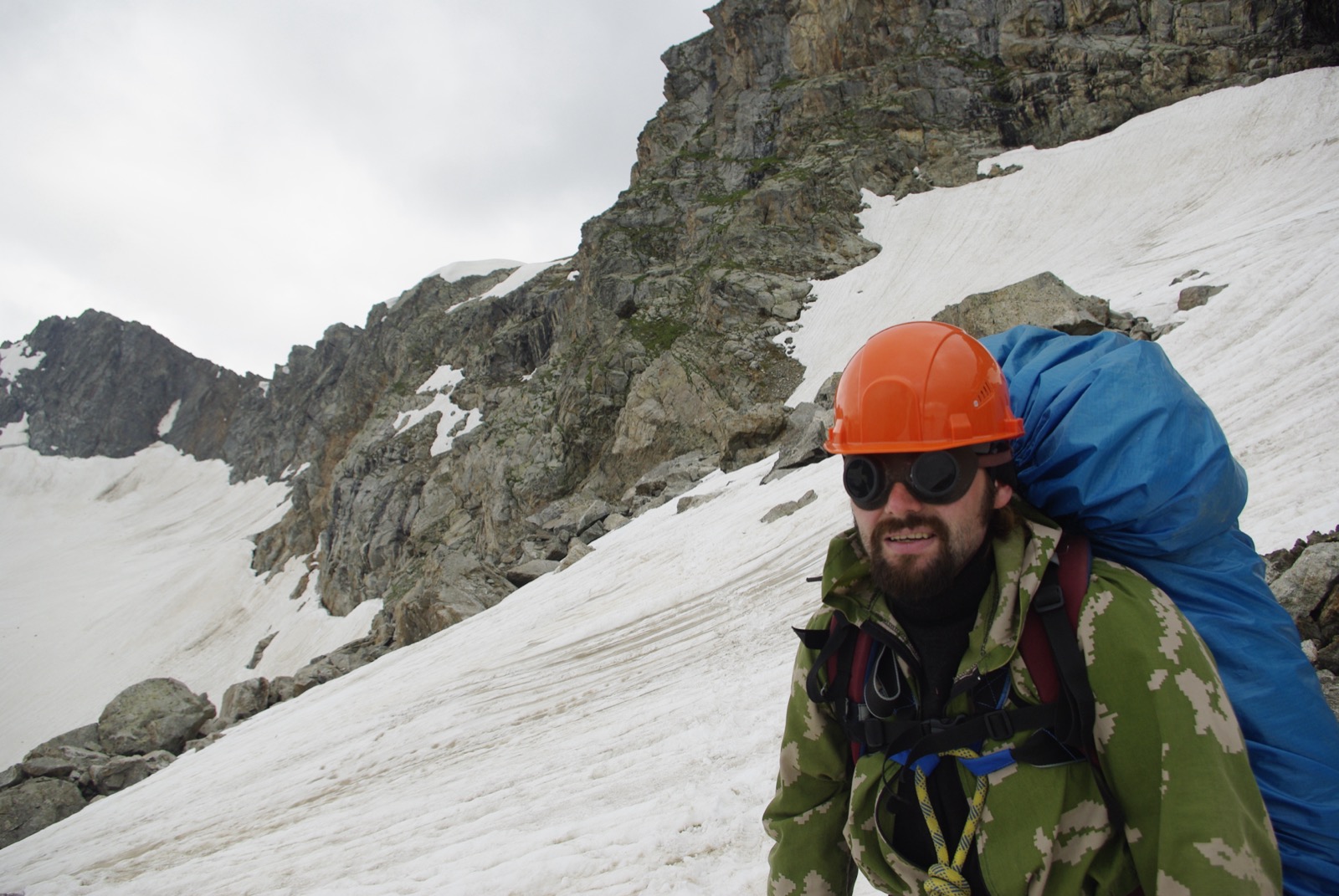 Climber wearing a helmet — head protection in the mountains