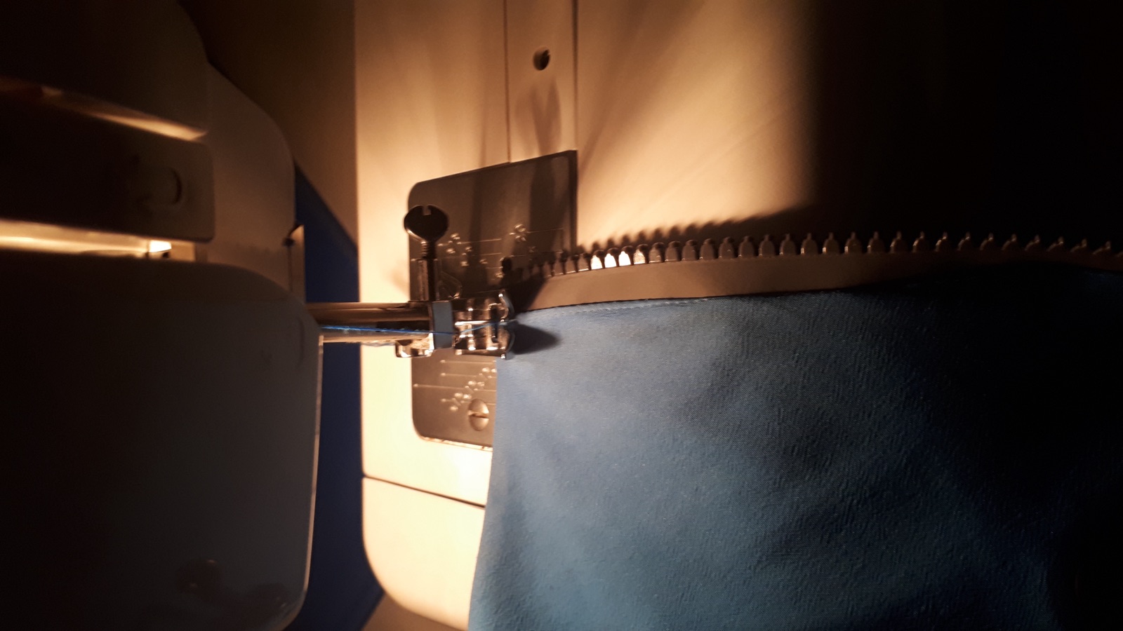 Sewing machine with a new zip during the sewing process.