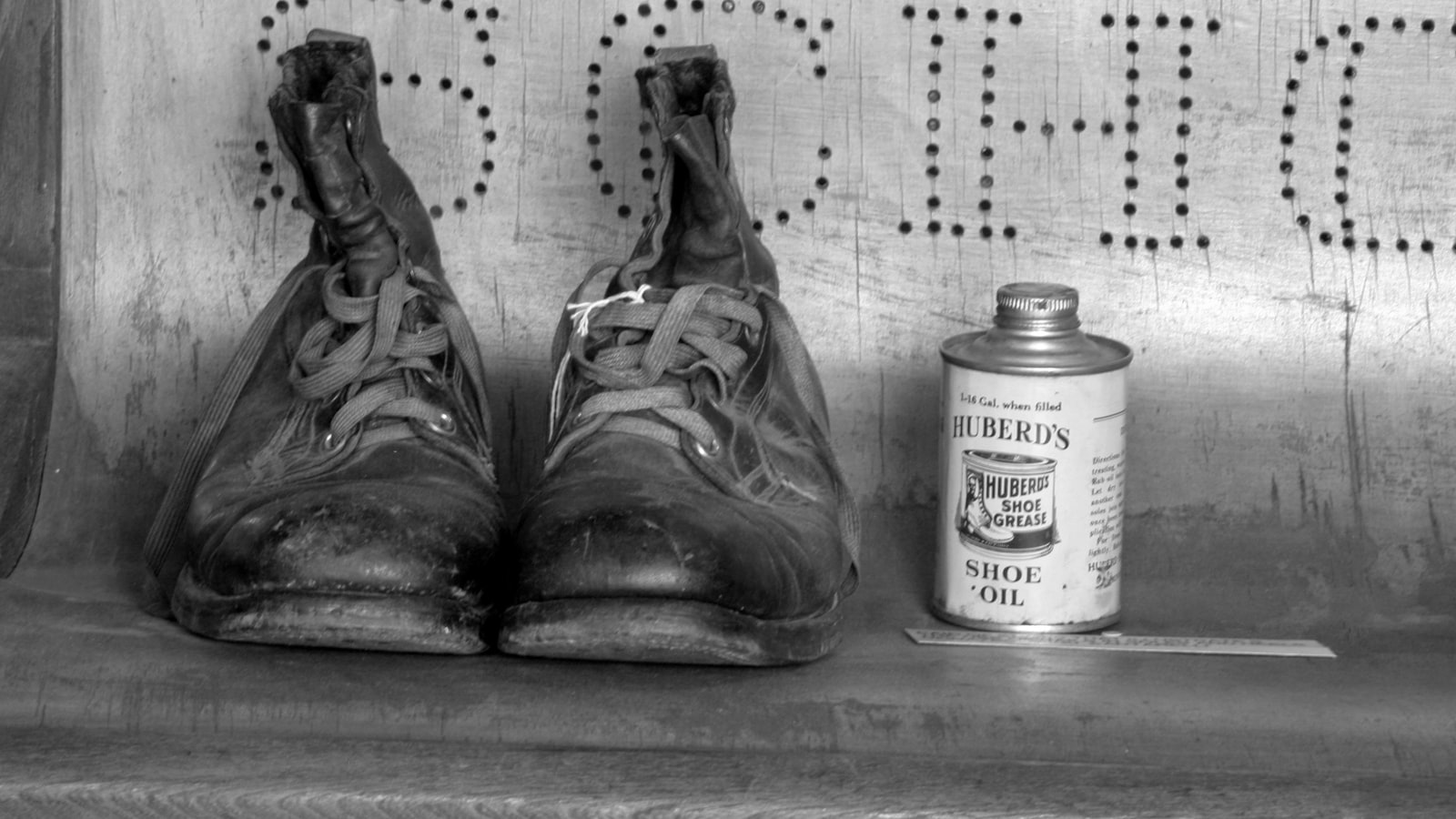 Boot with a loosened sole, ready for gluing.