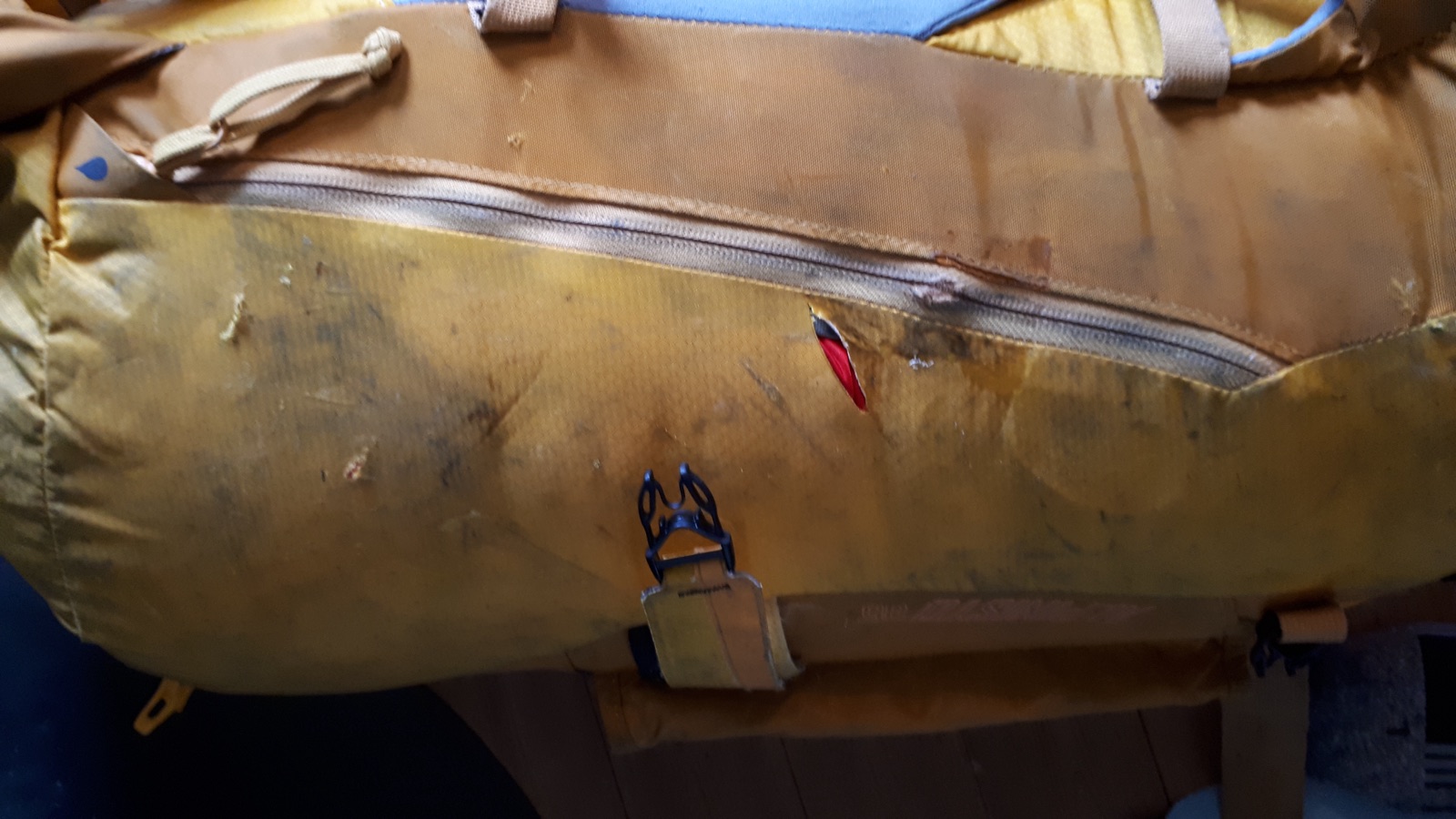 Pack with a glued-on reinforcement patch.