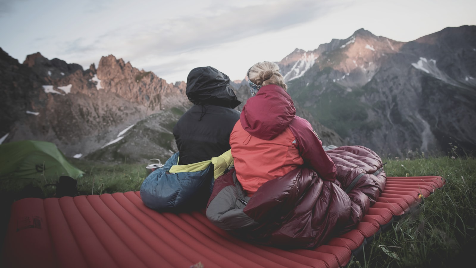 Inflatable sleeping mat with a patch.