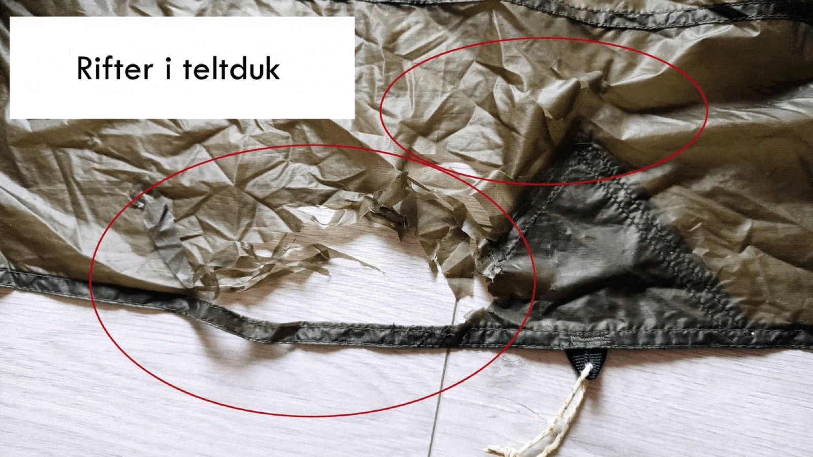 Tent fabric under a sewing machine with a new patch.