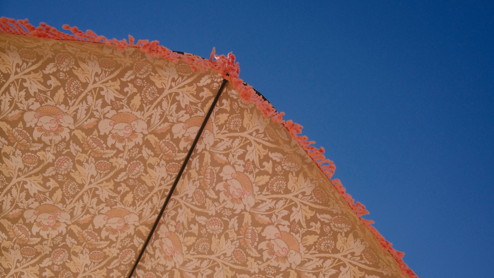 Tent seam being treated with a sealing agent.